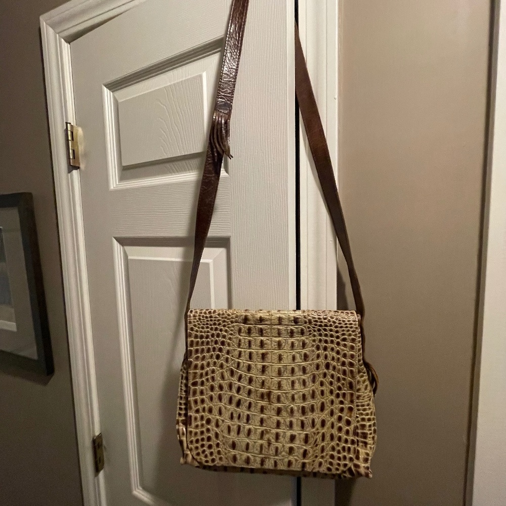B May fold over flap  embossed  purse